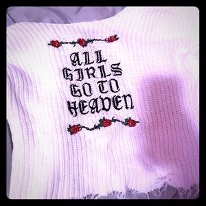 A cropped knitted sweater